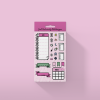 The JOOD Planner Sticker Collection features a set of decorative stickers on a pink background. The stickers include a spiral notebook, a to-do list, task icons (e.g., trash can, heart, moon, sun), banners, a calendar, and other symbols. The packaging is topped off with a purple header.