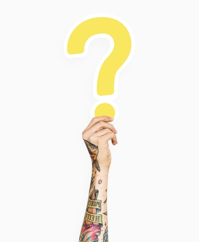 Hand holding a question mark